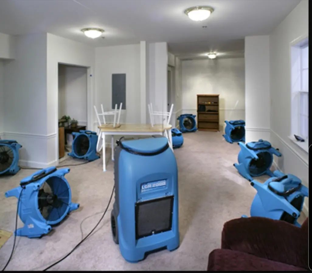 Air movers and dehumidifier setup for Water Damage Restoration in Spearfish