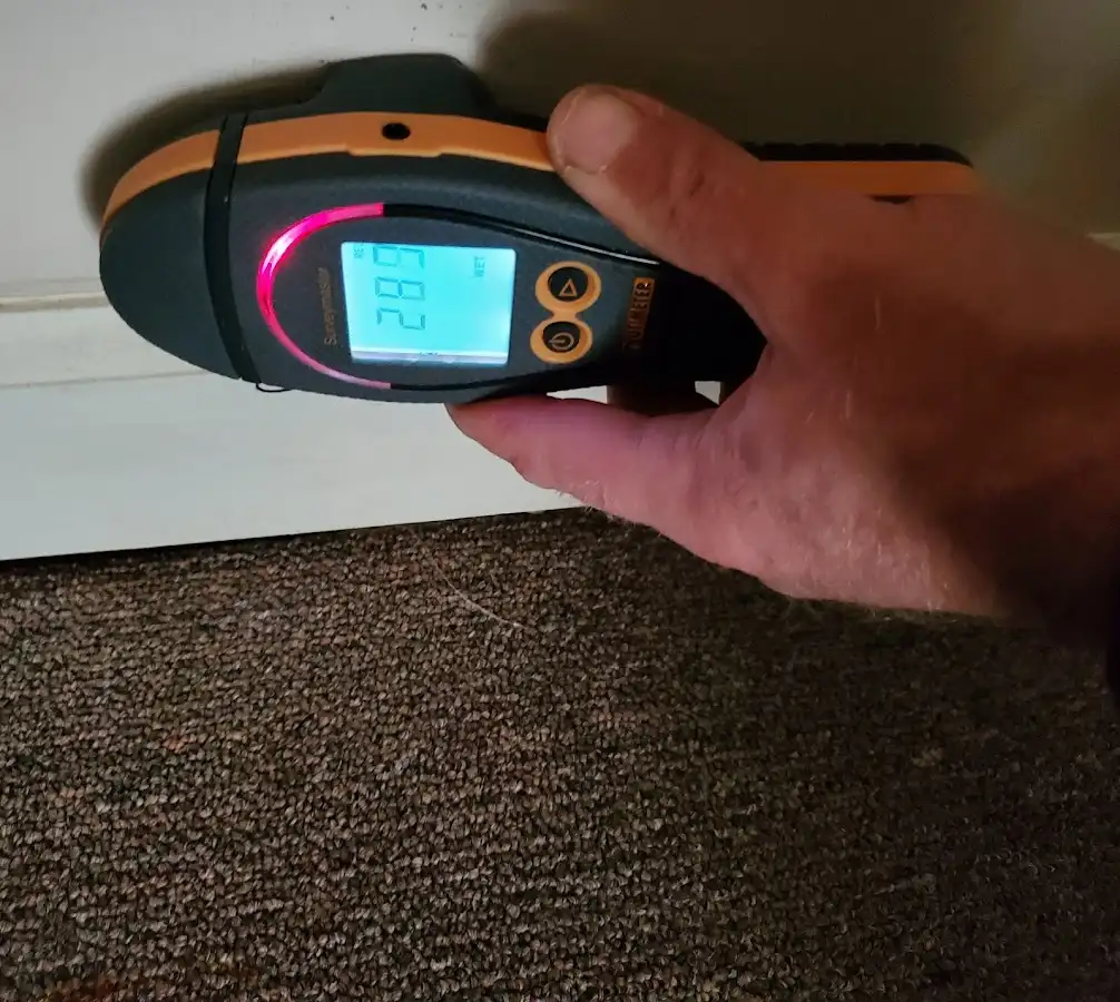 Moisture detection at baseboard during Burst Pipe Cleanup in Spearfish